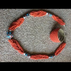 30”long hand made braided Red coral and silver from Mexico. CoralCuff added.